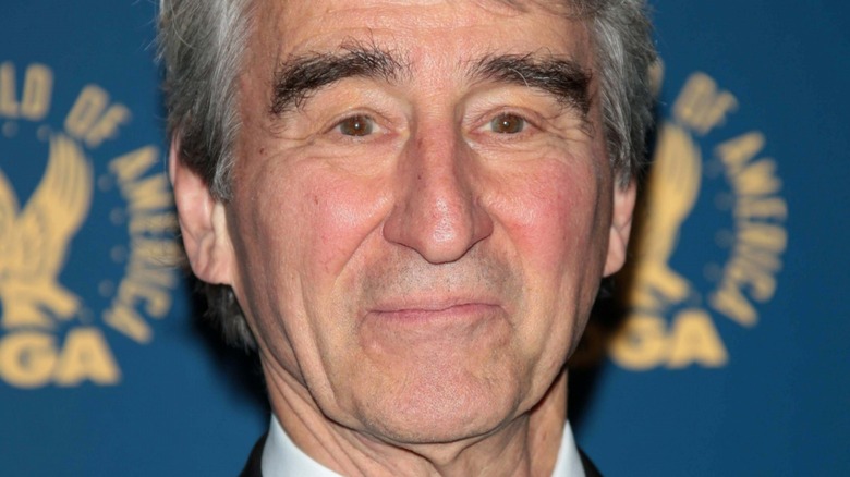 Actor Sam Waterston smirks