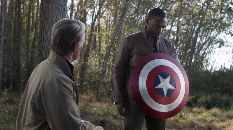 Sam holds the shield