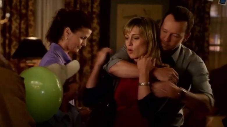 Donny Wahlberg hugging Amy Carlson