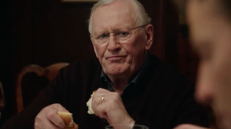 Len Cariou Henry Reagan Blue Bloods family dinner tearing bread annoyed face