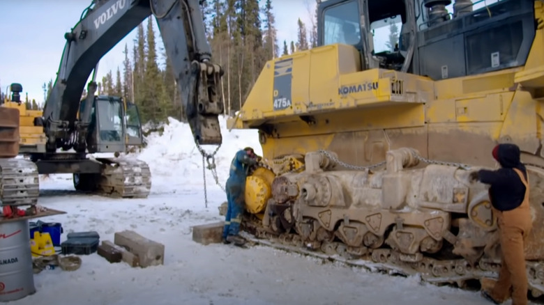 Gold Rush crew working on equipment
