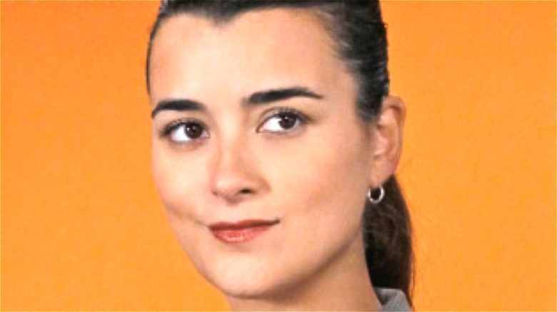 Cote de Pablo smirking