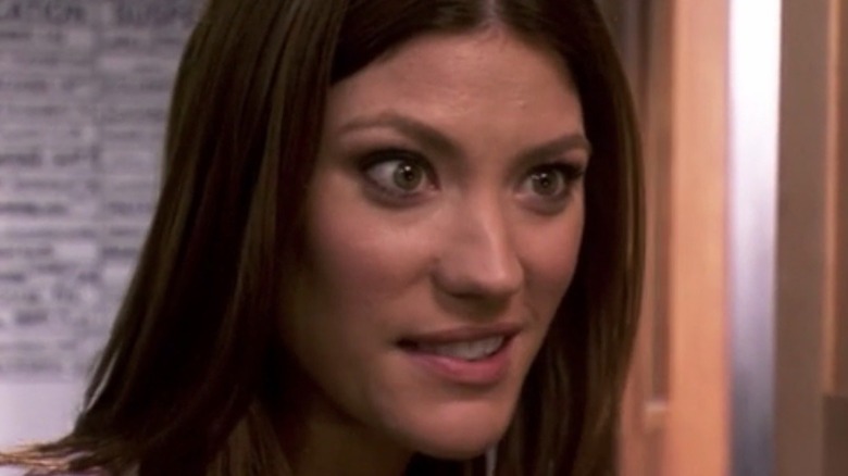 Debra Morgan smirking with eyebrows raised