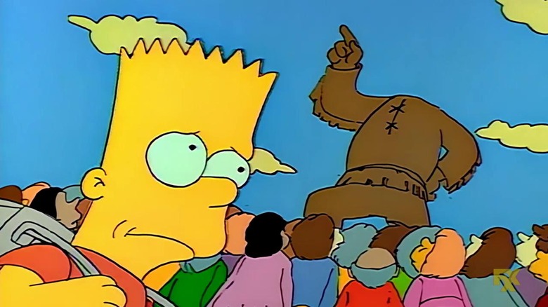 Bart Simpson and the headless statue of Jebediah Springfield in "The Telltale Head"
