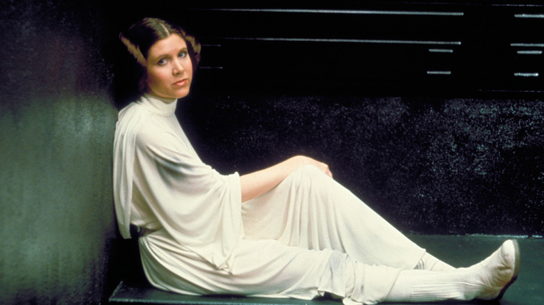 Princess Leia sitting in holding area (1977)