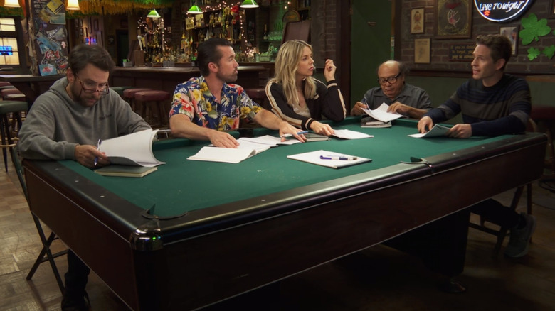The Gang around a pool table