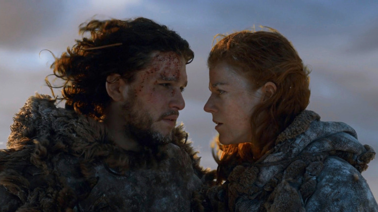 Jon Snow and Ygritte on top of the wall