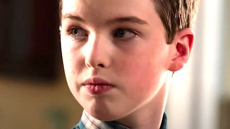 Young Sheldon looking suspicious