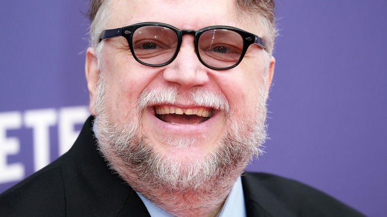 Guillermo Del Toro grins joyously