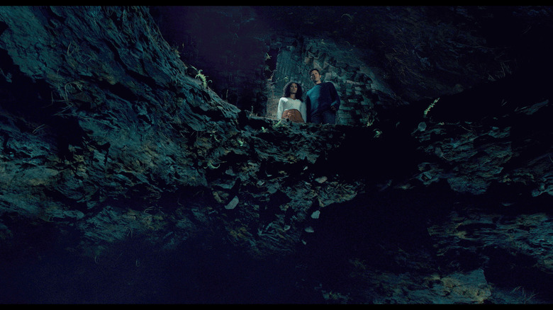 Margaret and Ben looking into the pit