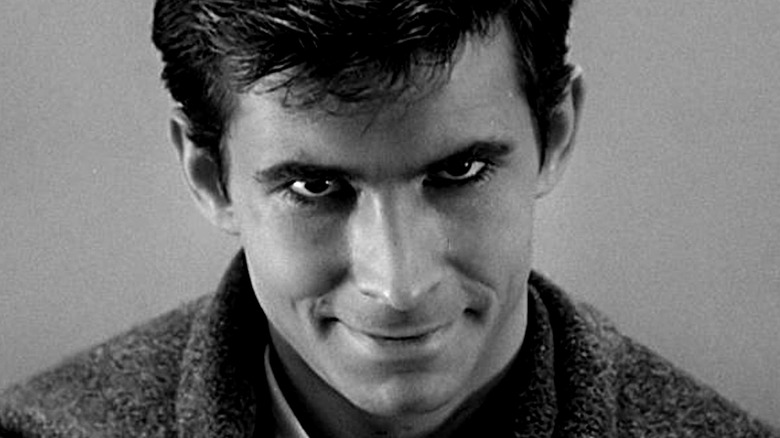 Norman Bates smiling dementedly