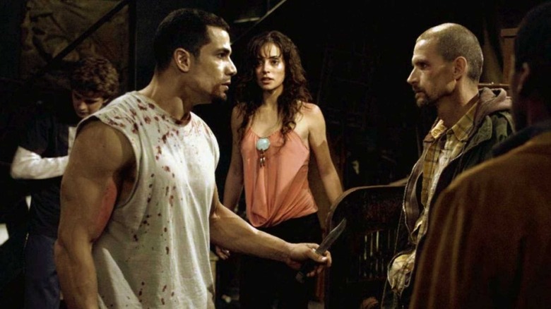 The gathering of Jigsaw's victims discusses their options