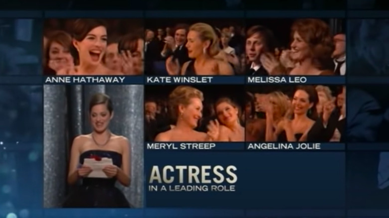 Anne Hathaway cheering for Kate Winslet