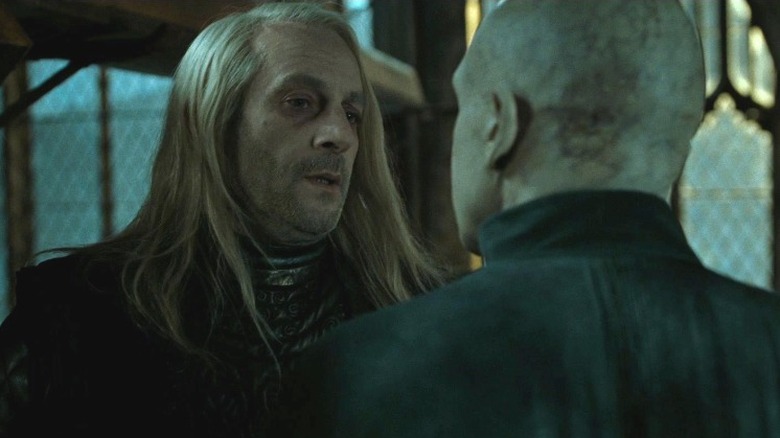 Lucius Malfoy talking to Voldemort