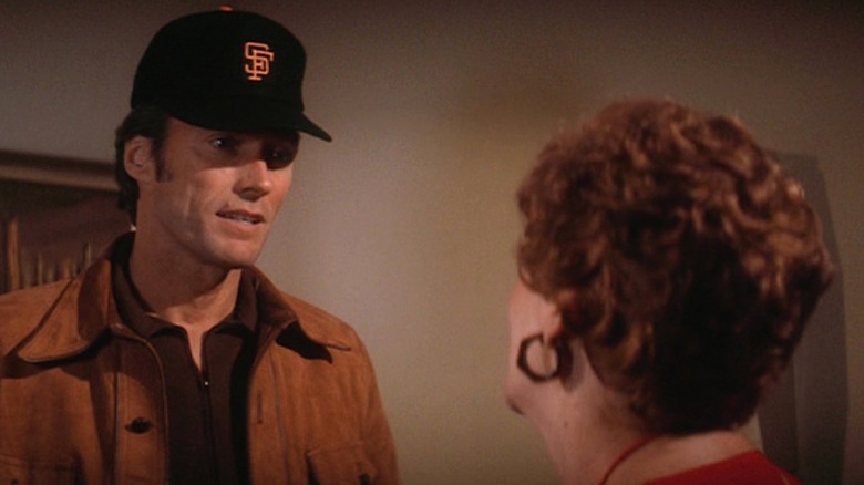 Harry Callahan wearing Giants cap