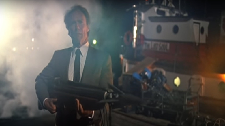 Harry Callahan holding harpoon cannon