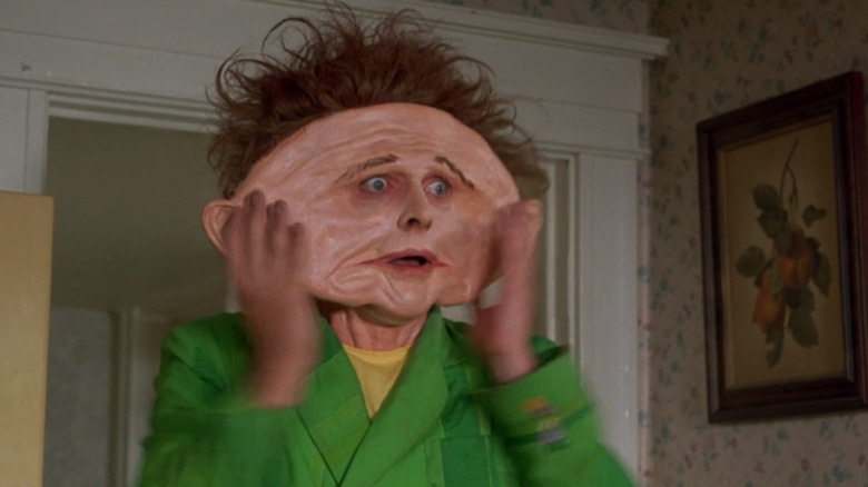 Drop Dead Fred panics as his head has been flattened