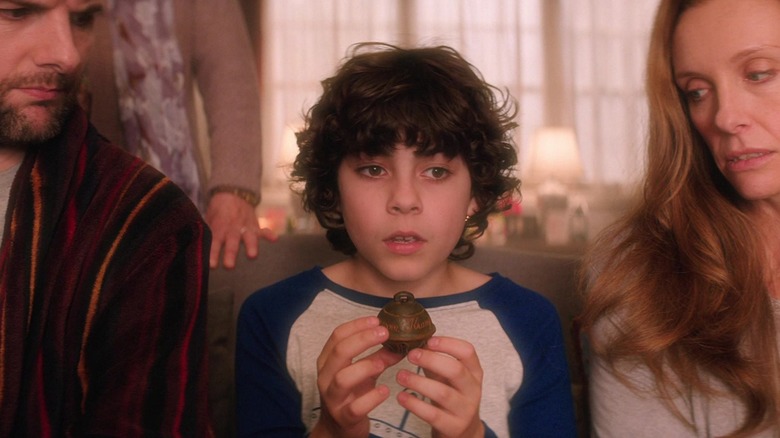 Max holding ornament in Krampus