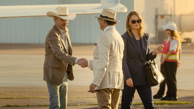 Tommy shaking hands on the tarmac in "Landman"