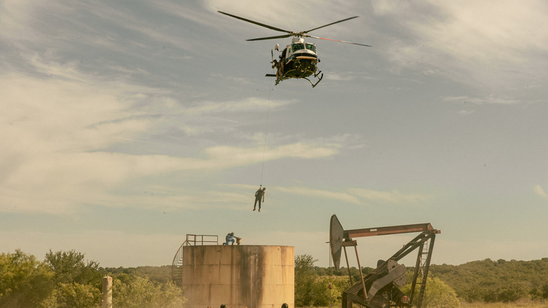 An air rescue takes place while a derrick is in use in "Landman"