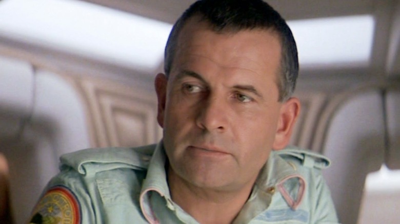 Ash's head covered in white milky fluid