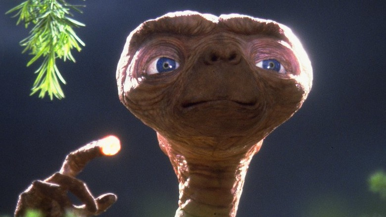 E.T. with glowing finger