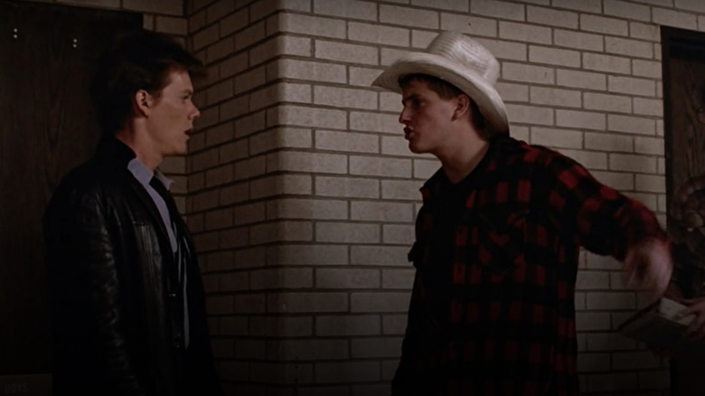 Chris Penn as Willard Hewitt and Kevin Bacon as Ren McCormack in Footloose