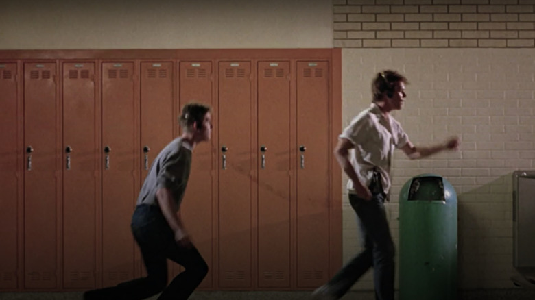 Chris Penn as Willard Hewitt and Kevin Bacon as Ren McCormack in Footloose