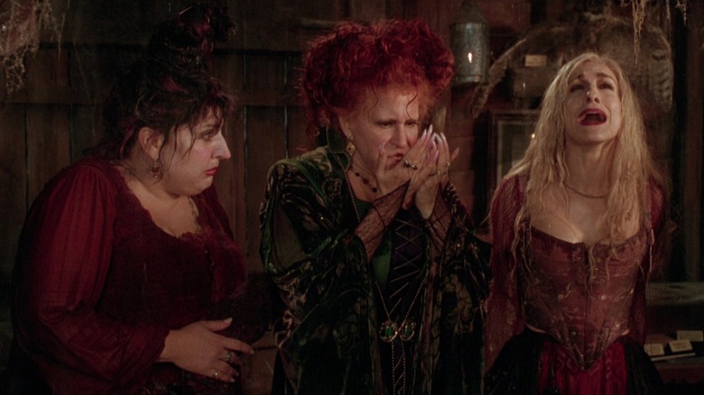 Mary, Sarah, and Winifred Sanderson drenched by sprinklers