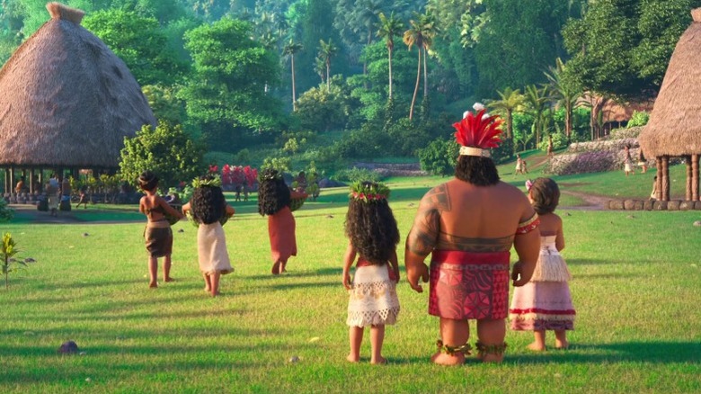 Moana, Tui, and Sina watching villagers walk by