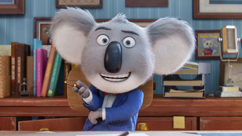 Buster at his desk Sing