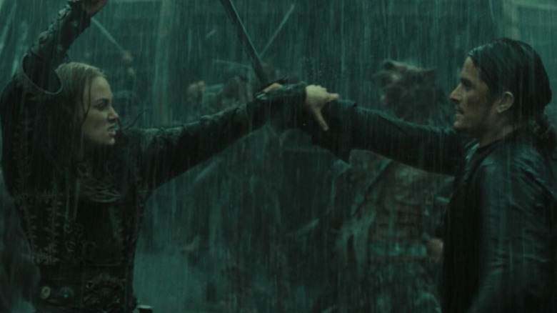 Keira Knightley and Orlando Bloom as Will and Elizabeth