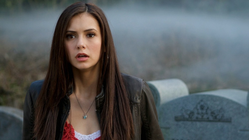 Elena at her parents' grave