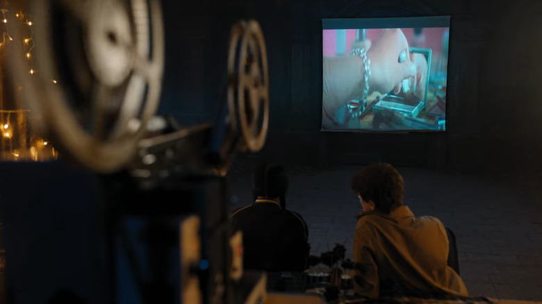 Wednesday and Tyler watching movie