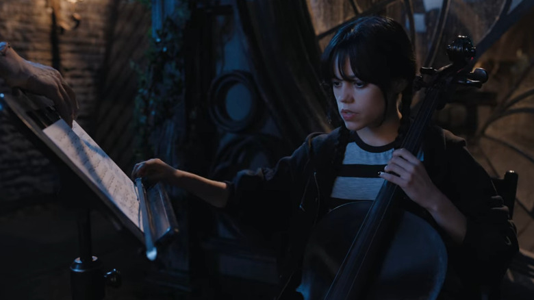 Wednesday sitting with her cello