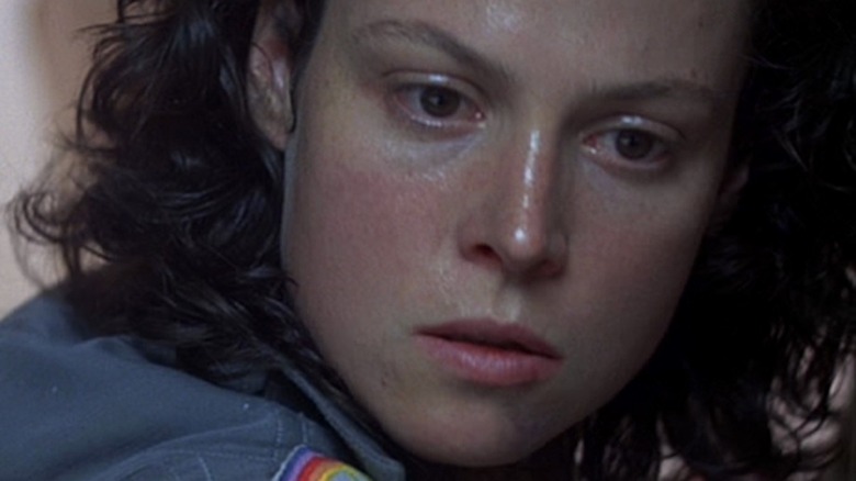 Upset Sigourney Weaver stares to side