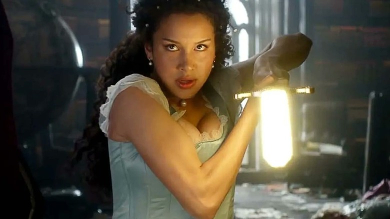 Sofia Wylie holding a glowing sword