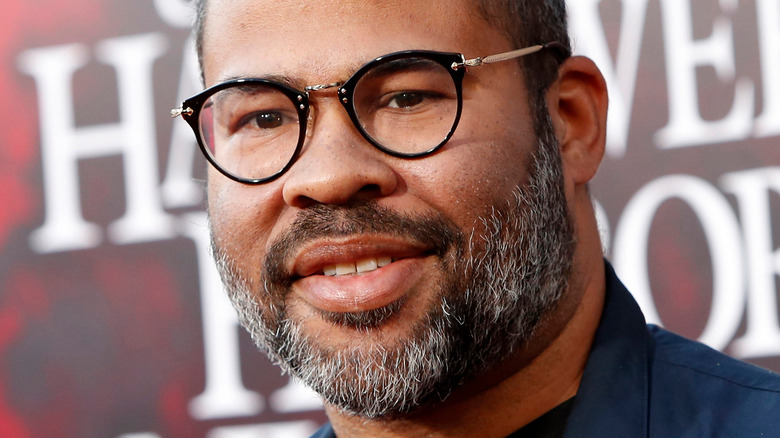 Jordan Peele with glasses and beard