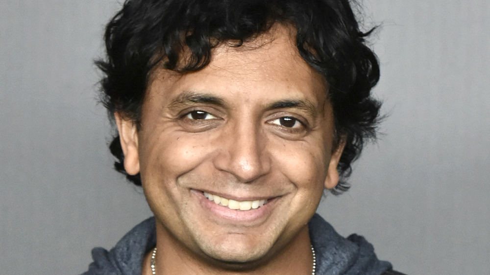 M. Night Shyamalan smiling