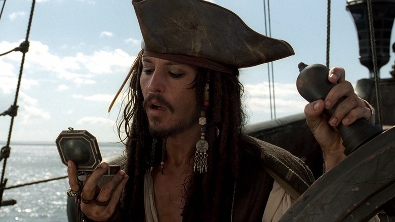 Jack looks at his compass