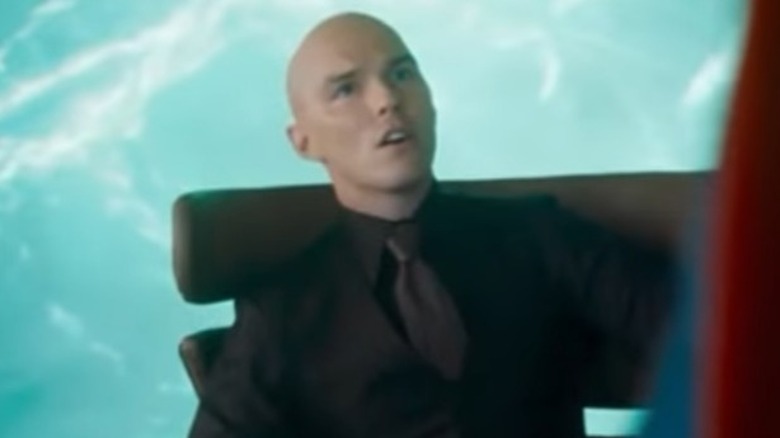 Lex Luthor sitting at his desk