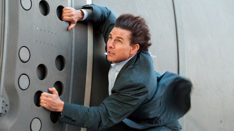 Ethan Hunt hangs on for dear life.