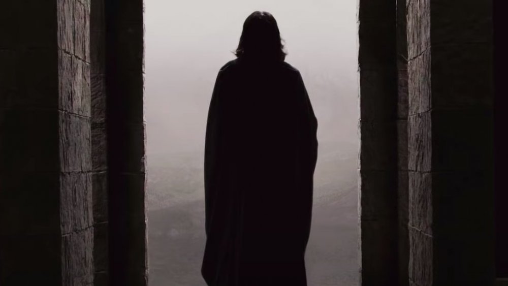 Alan Rickman as Severus Snape looking out over the Hogwarts grounds in Harry Potter and the Deathly Hallows -- Part 1