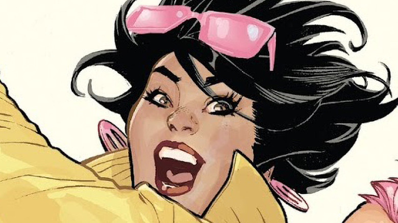 Jubilee smiling wearing pink sunglasses