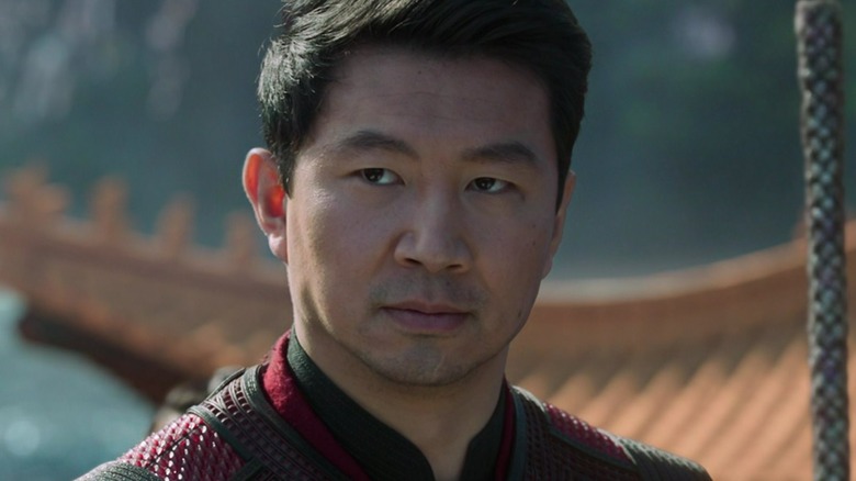 Shang-Chi Simu Liu smirks