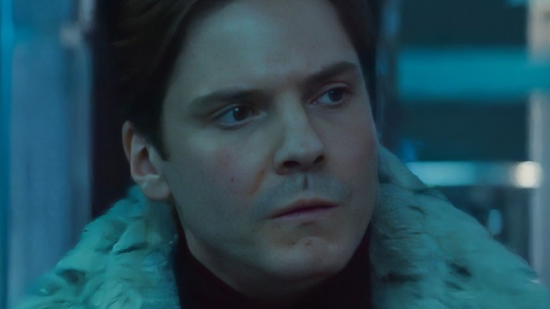 Baron Zemo looks to the side suspiciously