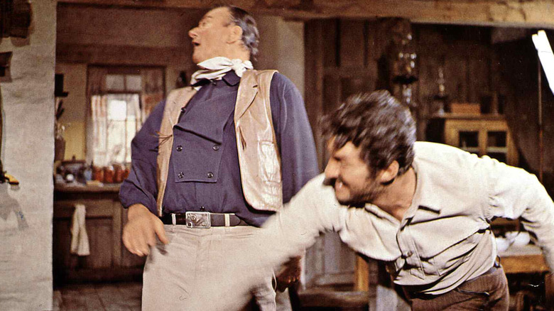 John Wayne being punched