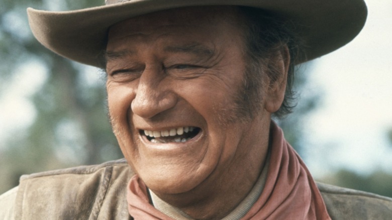 John Wayne laughing
