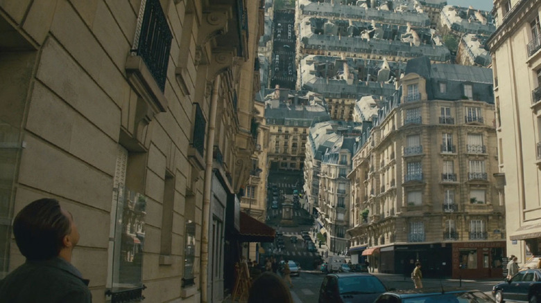 Dom looking at vertical street