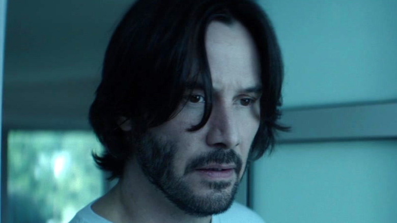 John Wick wearing white shirt